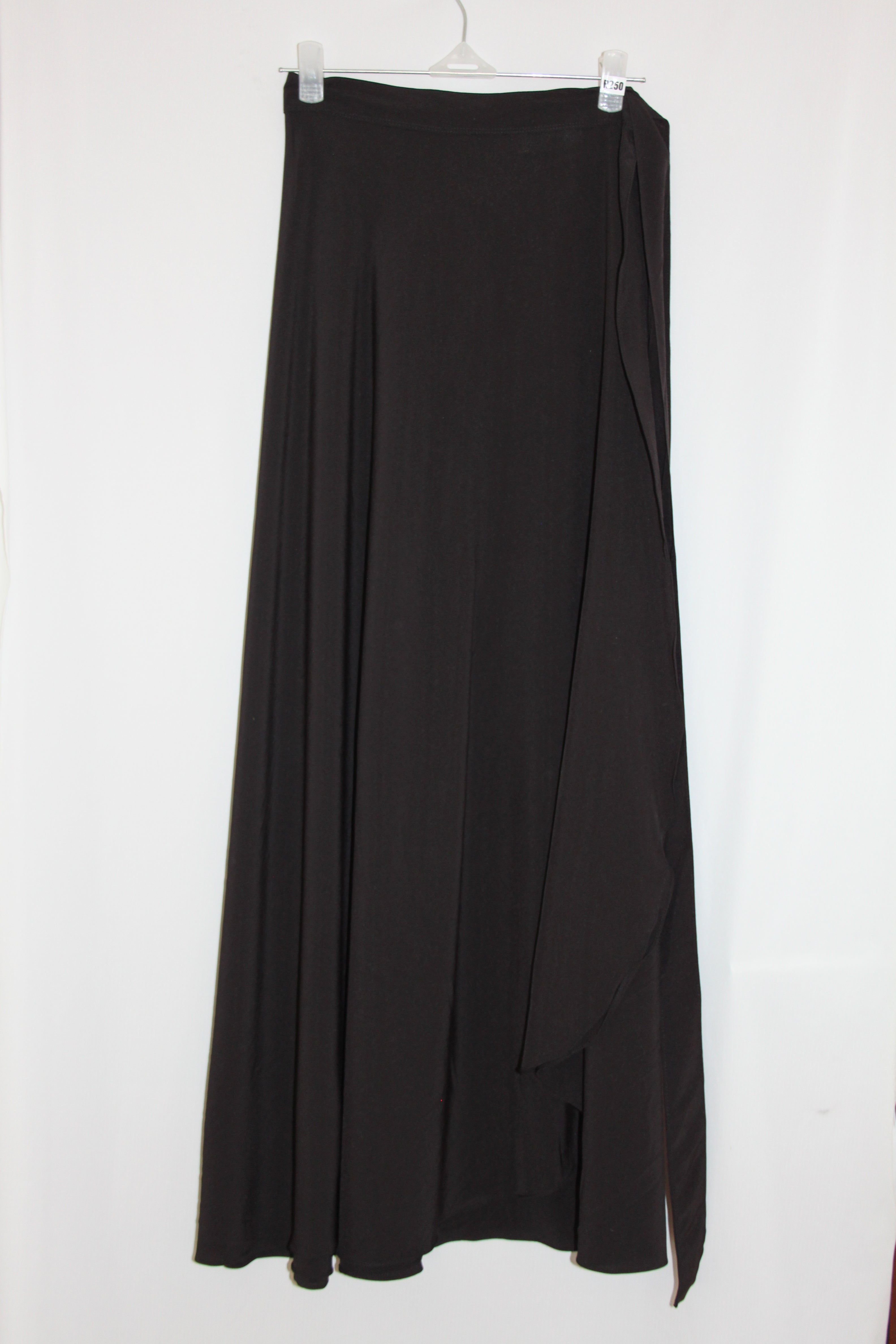 black wrap skirt on a white background