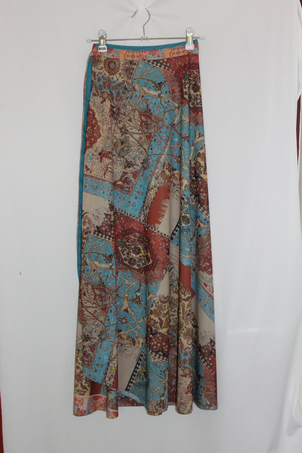 Roll of patterned fabric on a white background
