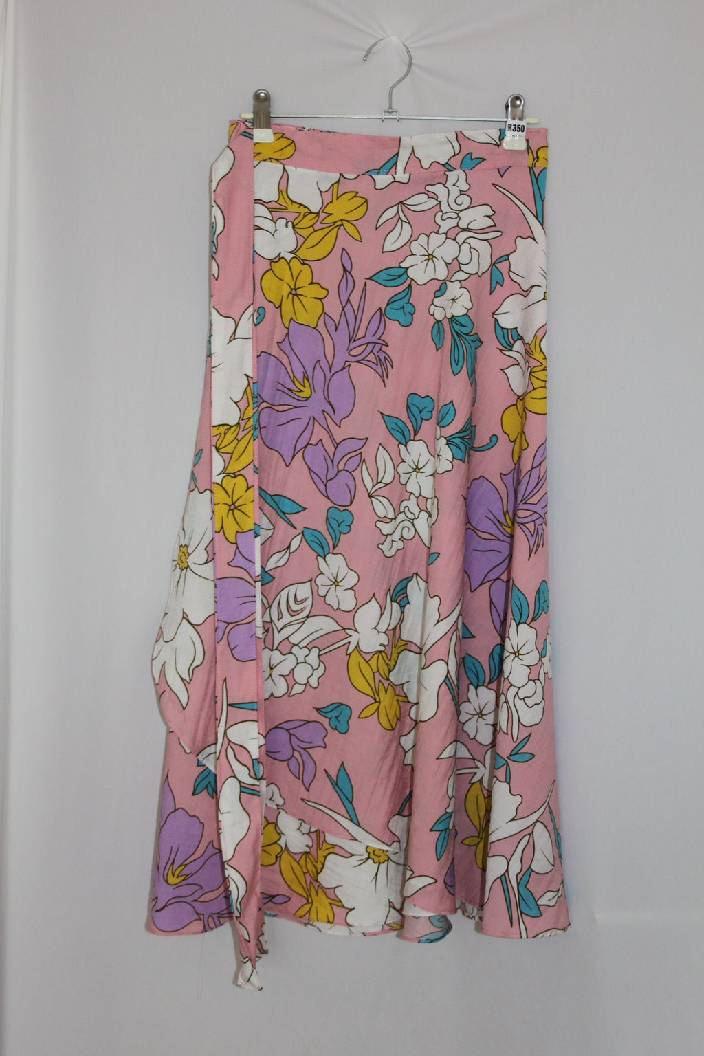 pink floral skirt on a white background