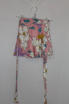 pink floral mini skirt on a white background